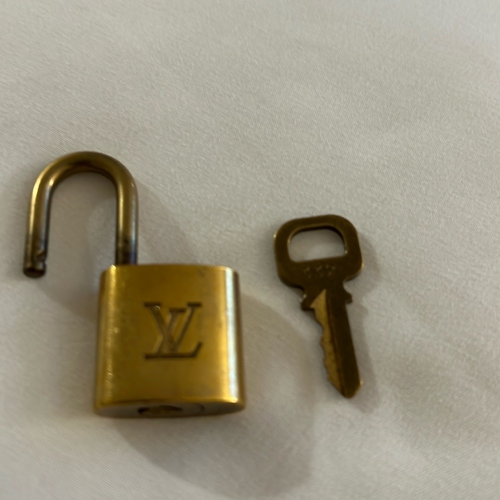 Louis Vuitton authentic lock and key 332